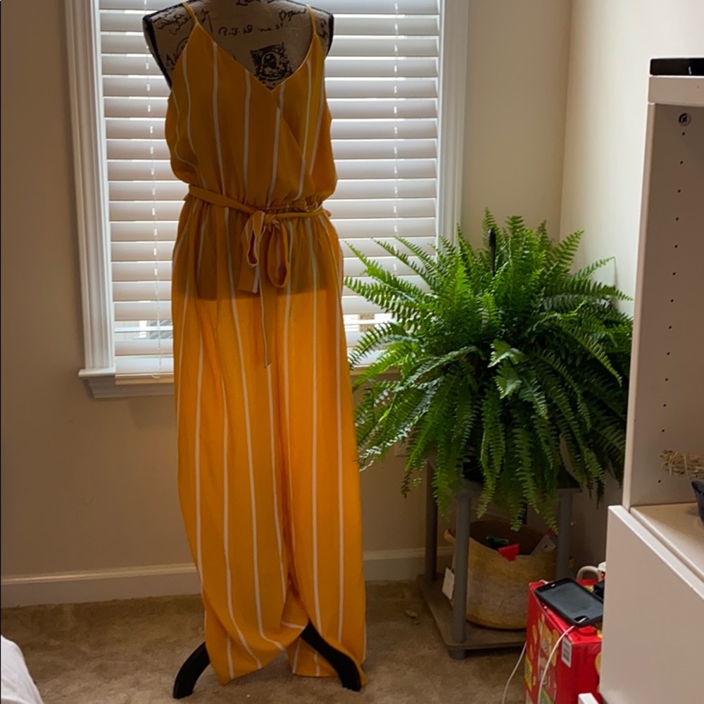 yellow and white jump suit